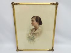 A gilt framed watercolour portrait of woman, signe