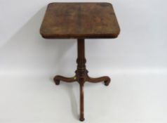 A Regency period rosewood wine table with walnut p