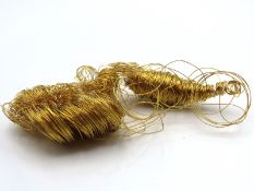 A yellow metal wire, tests electronically as 22ct