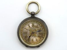 A silver pocket watch with silver & yellow metal d
