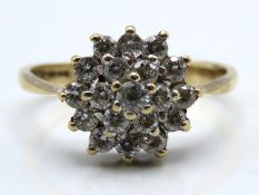 A 9ct gold diamond cluster ring of approx. 0.61ct,