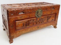 A compact carved camphor wood chest, 700mm wide x