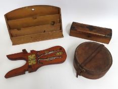 A wooden post rack, a leather collar box, a decora
