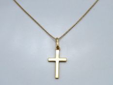 A 9ct gold 400mm long chain with cross pendant, 25
