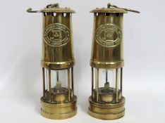 Two brass miners lamps by E. Thomas & Williams Ltd