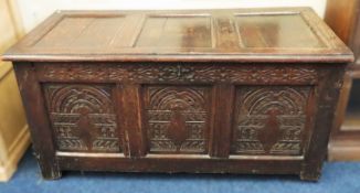 A 17th/18thC. carved oak coffer, 1250mm wide x 530