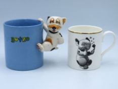 A Dennis China Works Bonzo mug, 70/250 twinned wit