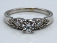 A 9ct white ring set with 0.31ct diamond, 2.5g, si