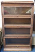 A GRM oak four piece barristers book case, 1460mm