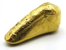 A yellow metal nugget, tests electronically as 18c