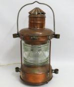 A large copper ships lamp, converted, numbered R52