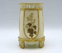 A Royal Worcester footed vase with reticulated fee