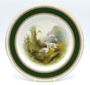 A Royal Worcester porcelain plate with hand painte