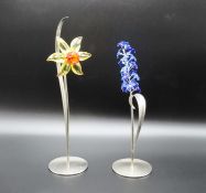 Two Swarovski crystal flowers with stands & origin