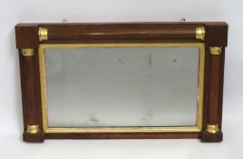 An early 19thC. Regency period rosewood mirror wit