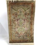 A silk pile carpet, 1400mm x 840mm