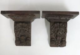 A pair of 19thC. oak lion mask corbels, 260mm high