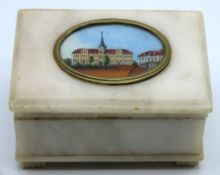 A 19thC. alabaster box set with cartouche holding