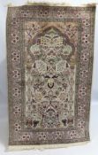 A silk pile Hereke carpet, 1540mm x 925mm