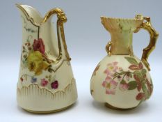 Two Royal Worcester porcelain jugs with decorative handles, gilding & floral decor, 130mm & 110mm ta