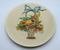 A Clarice Cliff 'My Garden' charger with relief fl