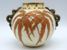 A Royal Worcester porcelain pot with gilding, serp