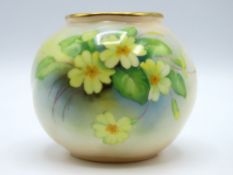 A Royal Worcester hand painted pot featuring primr