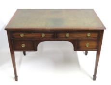 A Georgian style 19thC. leather topped mahogany de