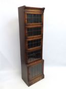 An oak Minty Library stacking bookcase with leaded