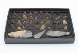 A collection of Neolithic arrow heads, forty three