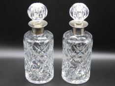 A pair of cut glass crystal decanters with Birming