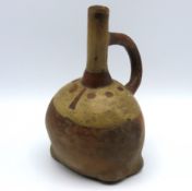 A Peruvian pre-7th century earthenware vessel, 185