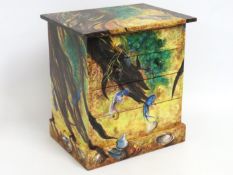 A small chest of four drawers hand painted with oc