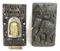 A Tibetan temple gong on carved mount, 430mm tall,
