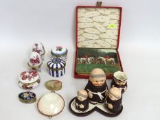 A Goebel monk cruet set, two porcelain trinket box