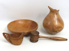 A selection of treen items including a bowl, vase,