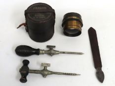A brass Aldis Anastigmat lens in Primus case, pate