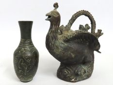 An archaic style Chinese vase twinned with a Chinese Phoenix censer