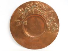An embossed copper wall hanger, possibly Hayle, 44