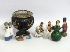 A Devon pottery jug with lid, a 1920's Crown Devon Fieldings pottery rose bowl, a Lladro swan, Goebe