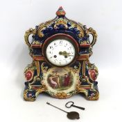 An antique continental majolica clock of decorativ
