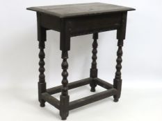 A 17th/18thC. oak bobbin leg lamp table, approx. 7