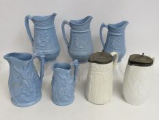 Three matching graduated Victorian ale jugs twinne