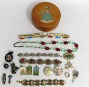 A selection of costume jewellery including a jade