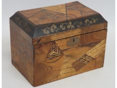 A 19thC. Japanese parquetry tea caddy with tin lin