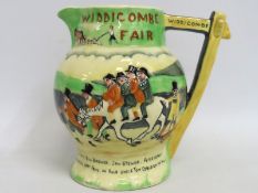 A Crown Devon Fieldings Old Uncle Tom Cobley Widecombe Fair musical jug, 188mm tall