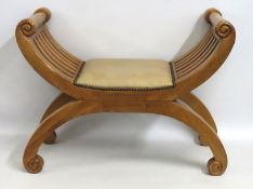 An oak curule style seat, 785mm wide x 600mm high