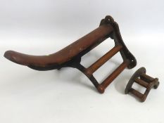 A cast iron & teak Musgrave, Belfast saddle rack w