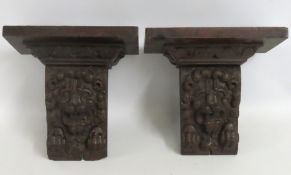 A pair of 19thC. oak lion mask corbels, 260mm high