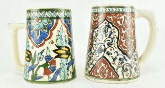 NEAR MATCHED PAIR OF TURKISH IZNIK WARE HAND PAINTED CERAMIC MUGS